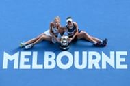 Barbora Krejcikova and Katerina Siniakova with the 2022 trophy.